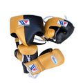 Boxing headgear and gloves with a brand logo on a wooden surface