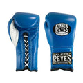 A pair of blue leather boxing gloves shown from the front and side against a plain white background. The gloves feature the 'Electro Reyes' brand logo on the back of the hand and a black-and-white lace-up closure on the side.