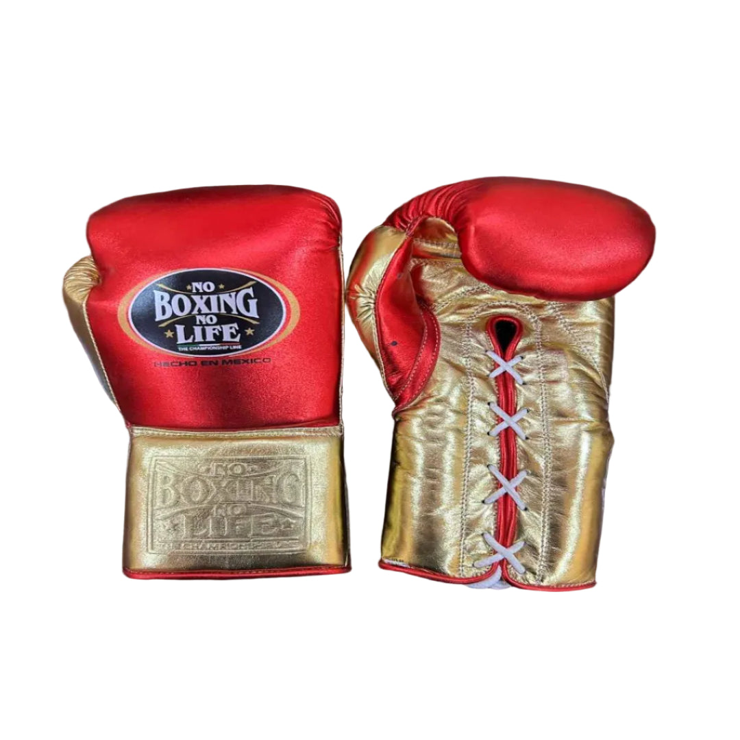 Red and gold boxing gloves with 'Pro Boxing Life' branding on a wooden surface.