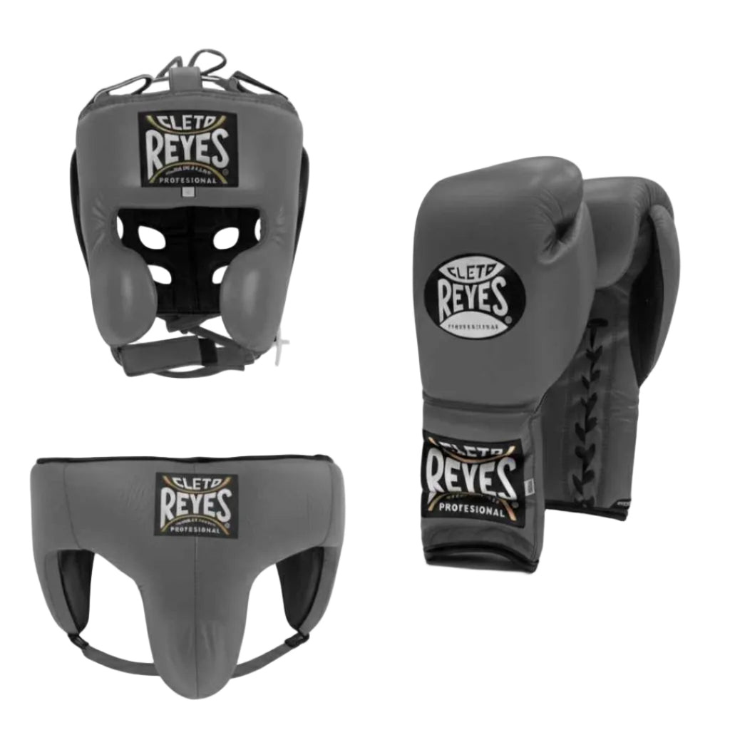 Cleto Reyes boxing headgear and gloves on a white background