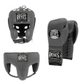 Cleto Reyes boxing headgear and gloves on a white background