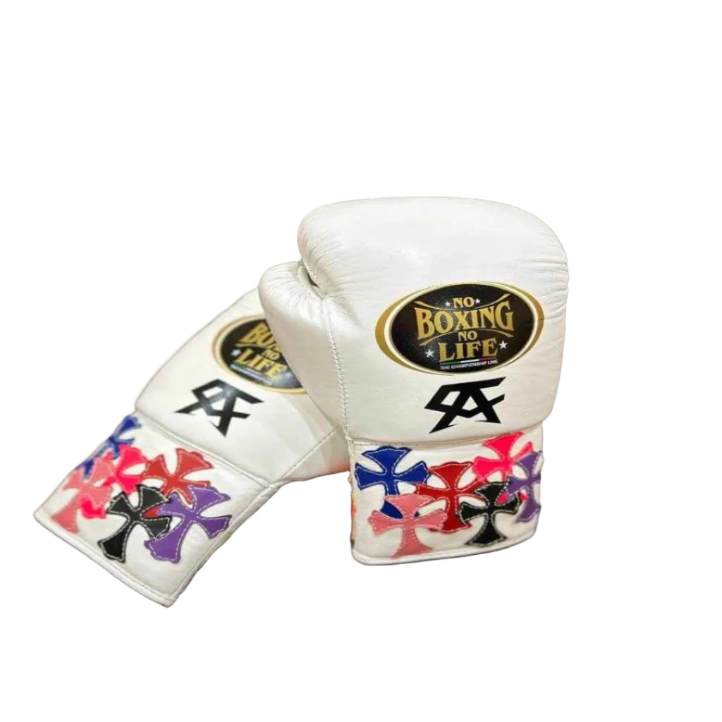 White boxing glove with colorful designs and 'Boxing is Life' logo on a wooden surface.