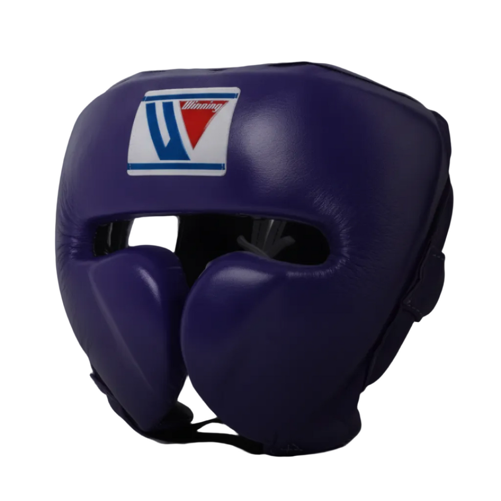 A purple leather boxing headguard with a white, red, and blue logo patch on the forehead, set against a dark blue gradient background.