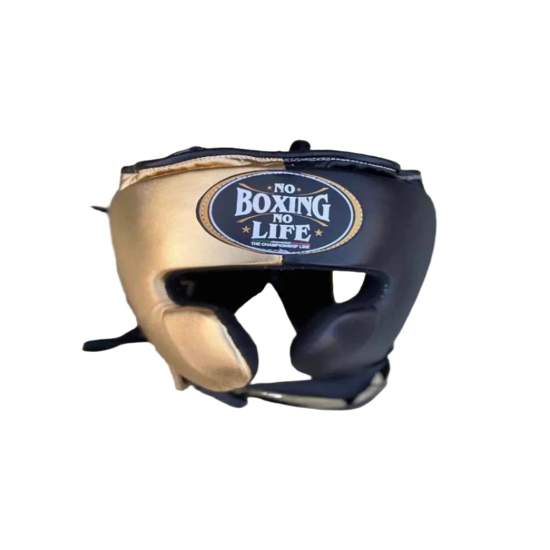 Boxing headgear with 'No Boxing No Life' logo on a wooden surface