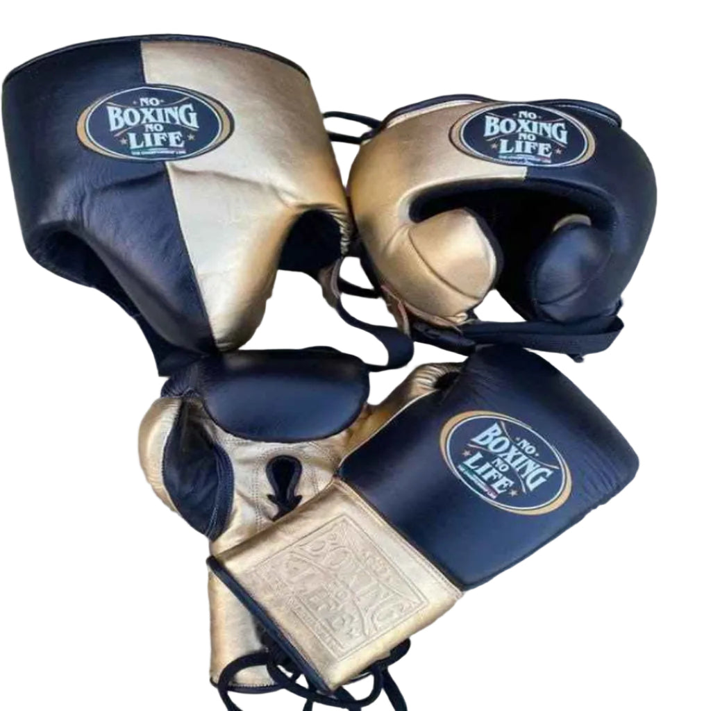 Pair of boxing gloves with 'The Boxing Life' branding on a wooden surface