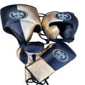 Pair of boxing gloves with 'The Boxing Life' branding on a wooden surface