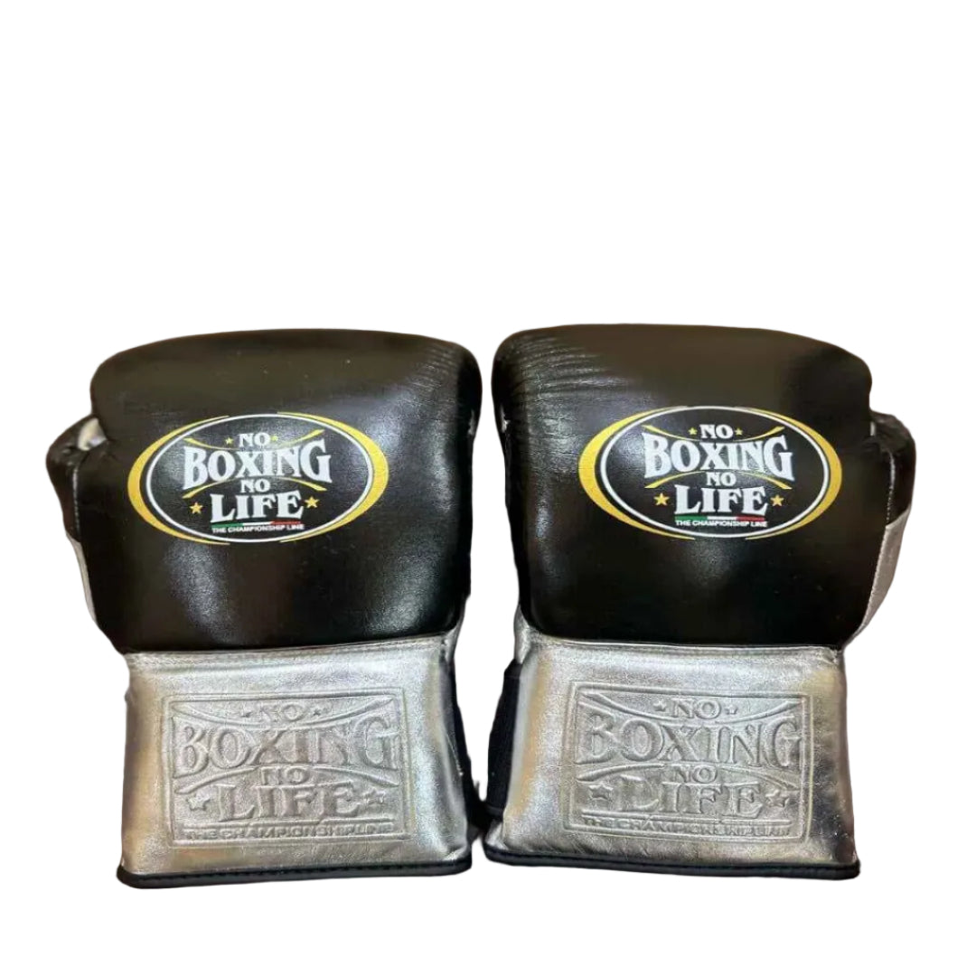 Pair of black boxing gloves with 'No Boxing No Life' branding on a wooden surface