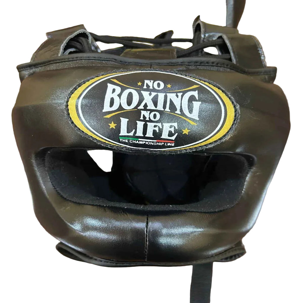 Black boxing headgear with 'No Boxing No Life' logo on a wooden surface