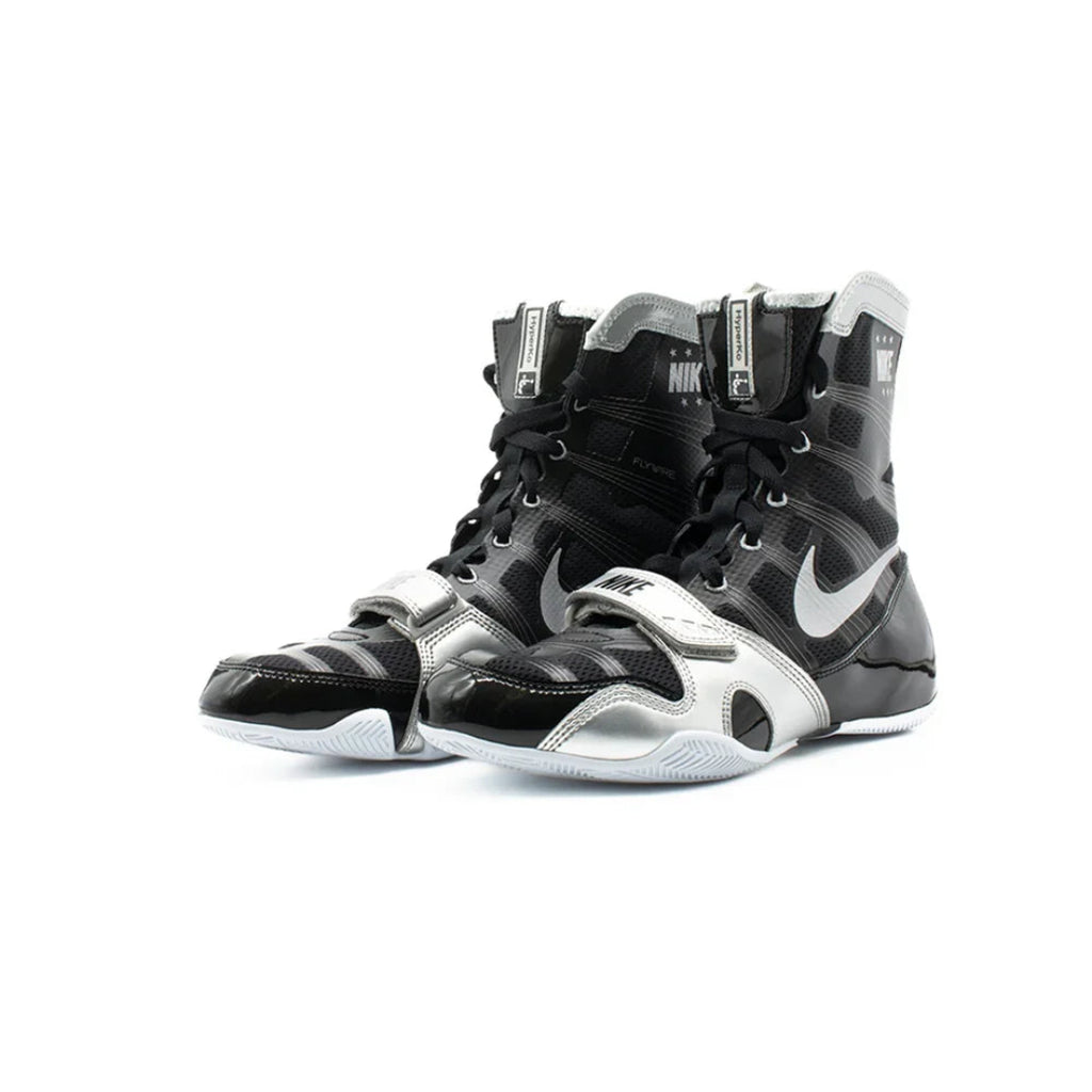 Black and white Nike boxing shoes on a white background