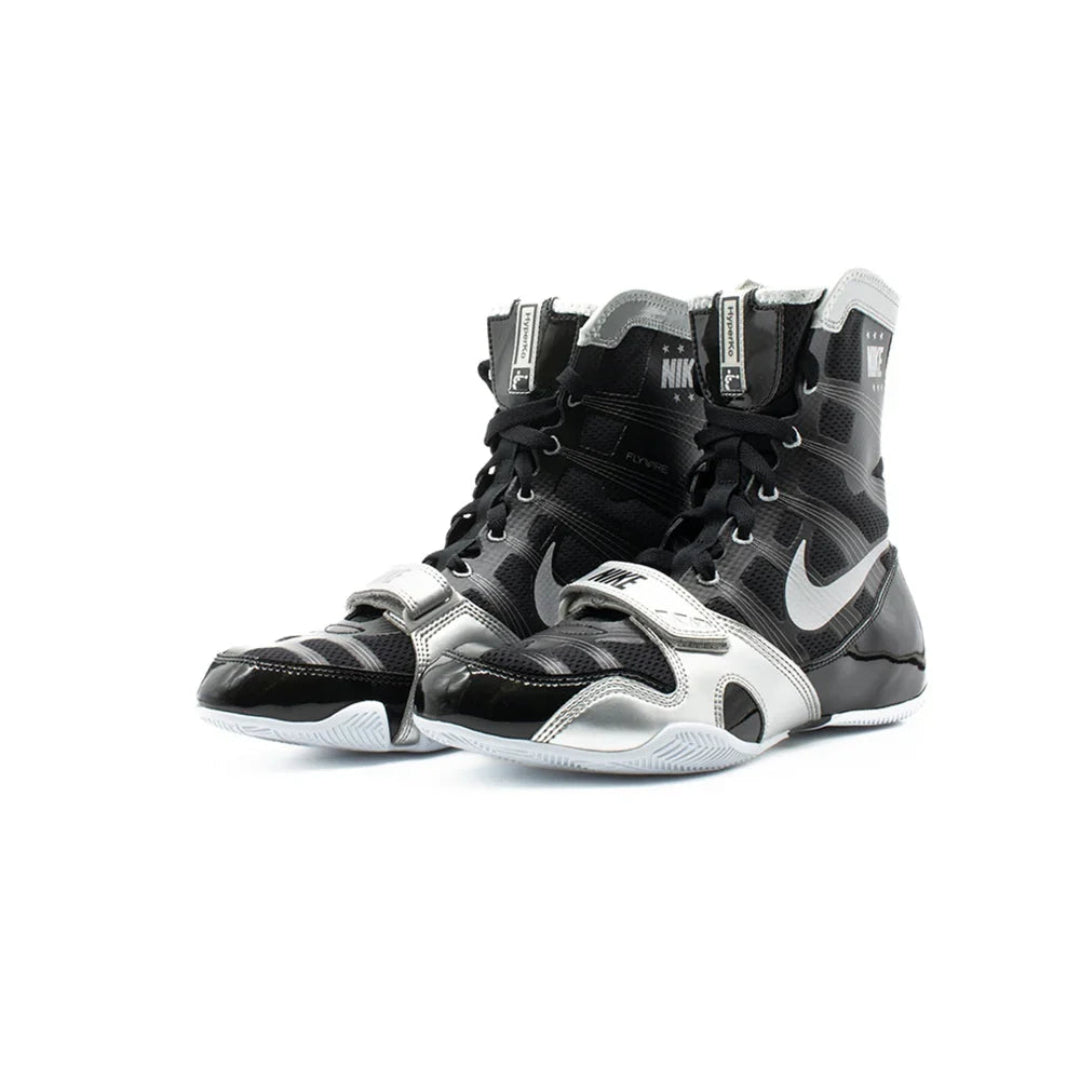 Black and white Nike boxing shoes on a white background