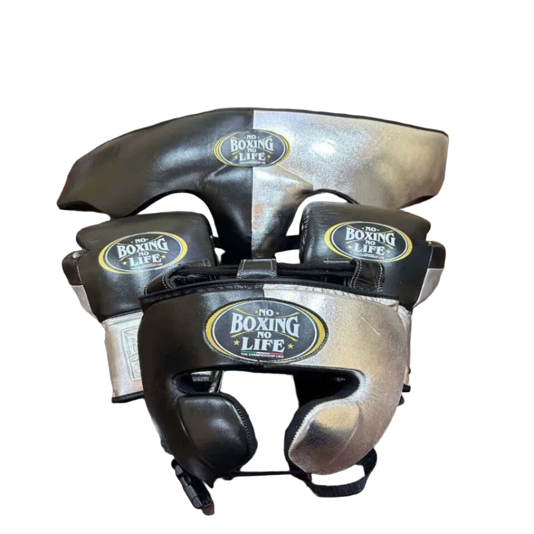 Pair of boxing headgear with 'No Boxing No Life' branding on a wooden surface.