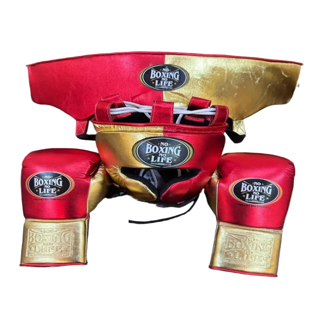 Boxing gear set with headgear, gloves, and shin guards on a wooden surface, branded 'Boxing Life'.