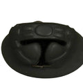 Black leather helmet on a gray surface