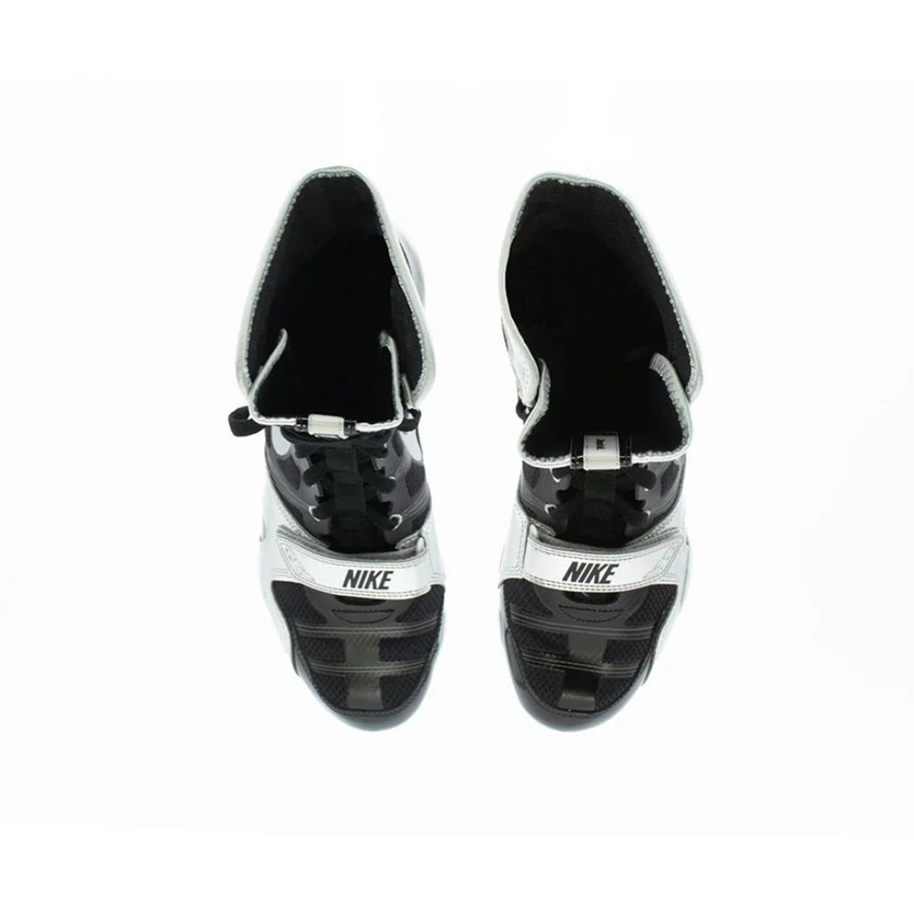 A pair of Nike high-top athletic shoes in black and white, shown from a top-down view on a plain white background.