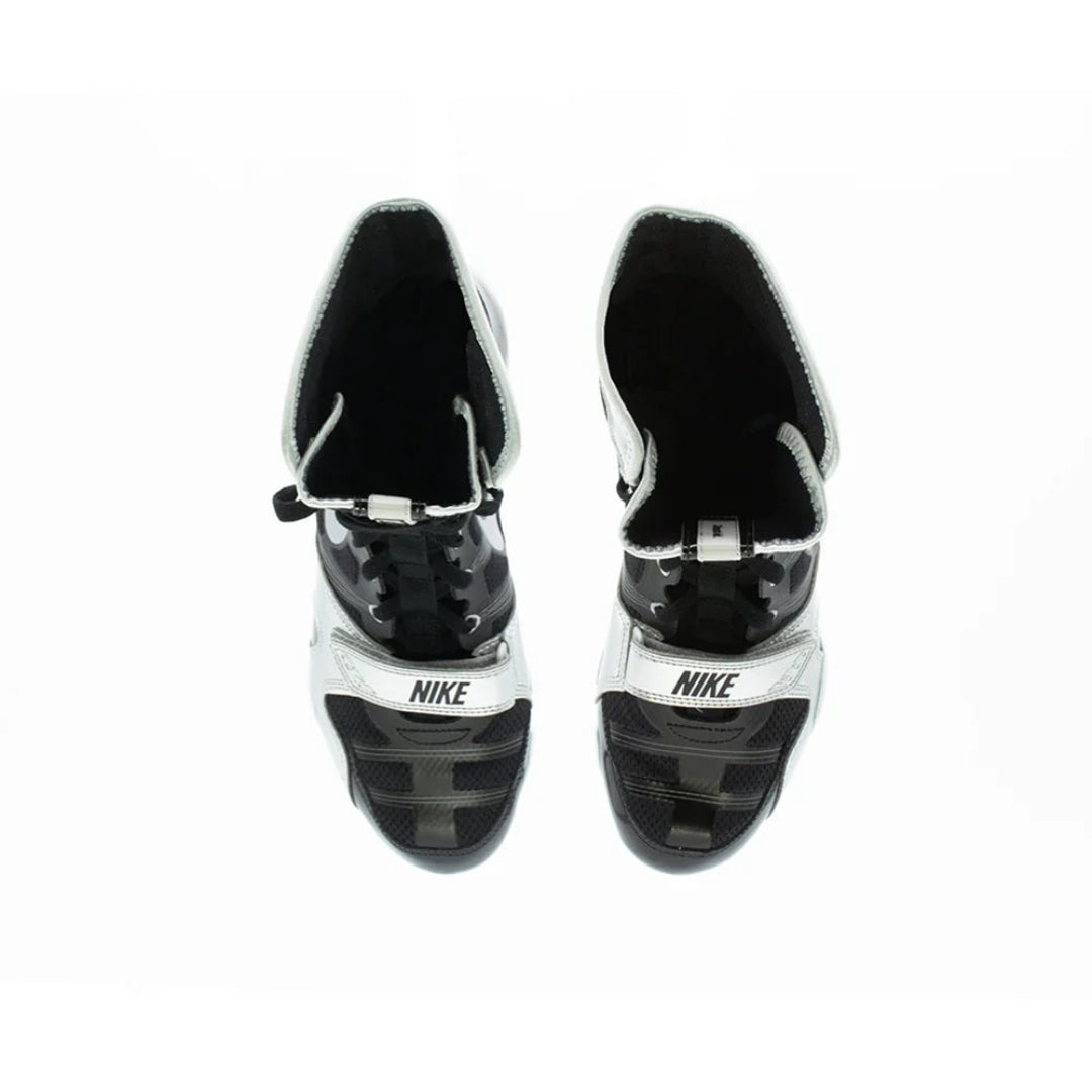 A pair of Nike high-top athletic shoes in black and white, shown from a top-down view on a plain white background.