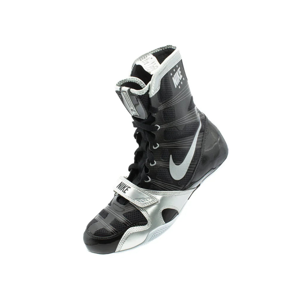 Black and silver boxing shoe with Nike logo on a white background