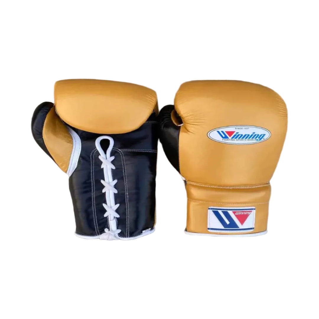 Pair of boxing gloves with a brand logo on a wooden background