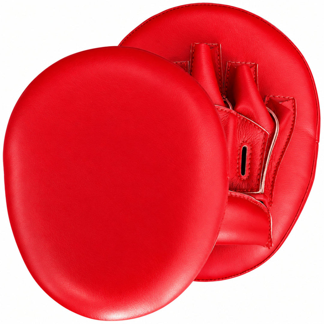 Red boxing mitts with a visible brand logo on a white background
