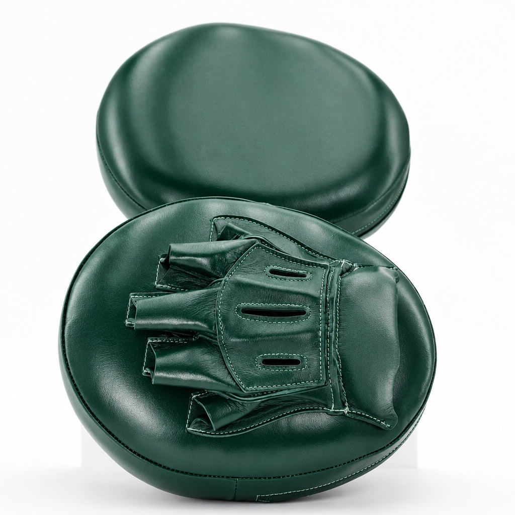 Green boxing mitts with a brand logo on a white background