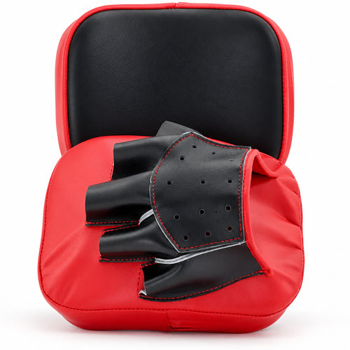 Red boxing mitt with black glove on a white background