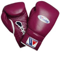 Pair of maroon boxing gloves with a brand logo on a black background
